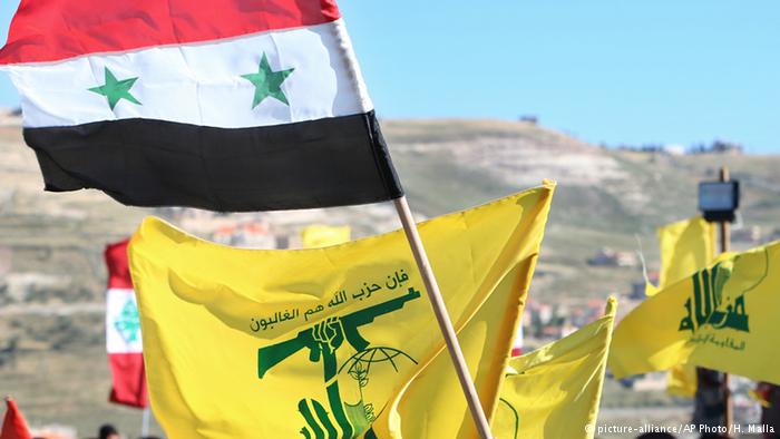 علم سورية الرسمي يرفرف على مقر القمة وحزب الله ليس ارهابيا